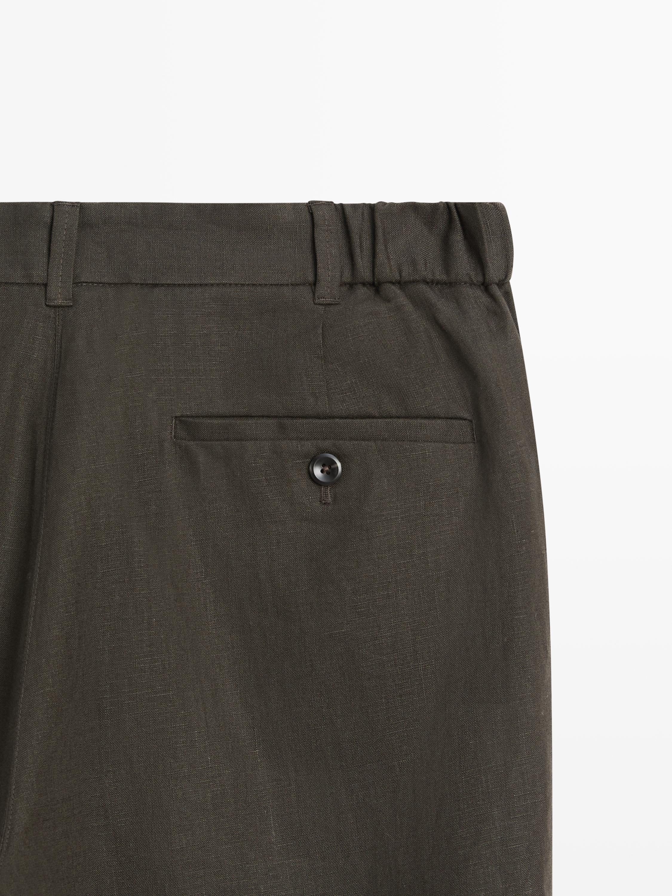 Tapered fit linen trousers